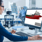 Engineer reviews 3D model view of ship's engine room with CADMATIC eBrowser Free. 3D viewer shows layout for installation